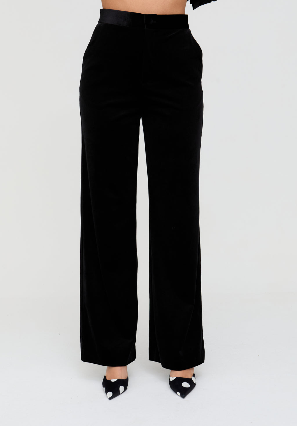 Black wide-leg pants on a white background
