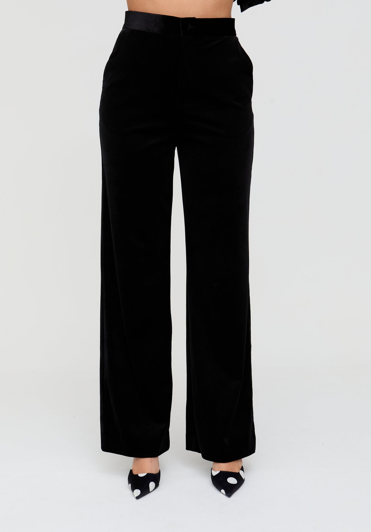 Black wide-leg pants on a white background