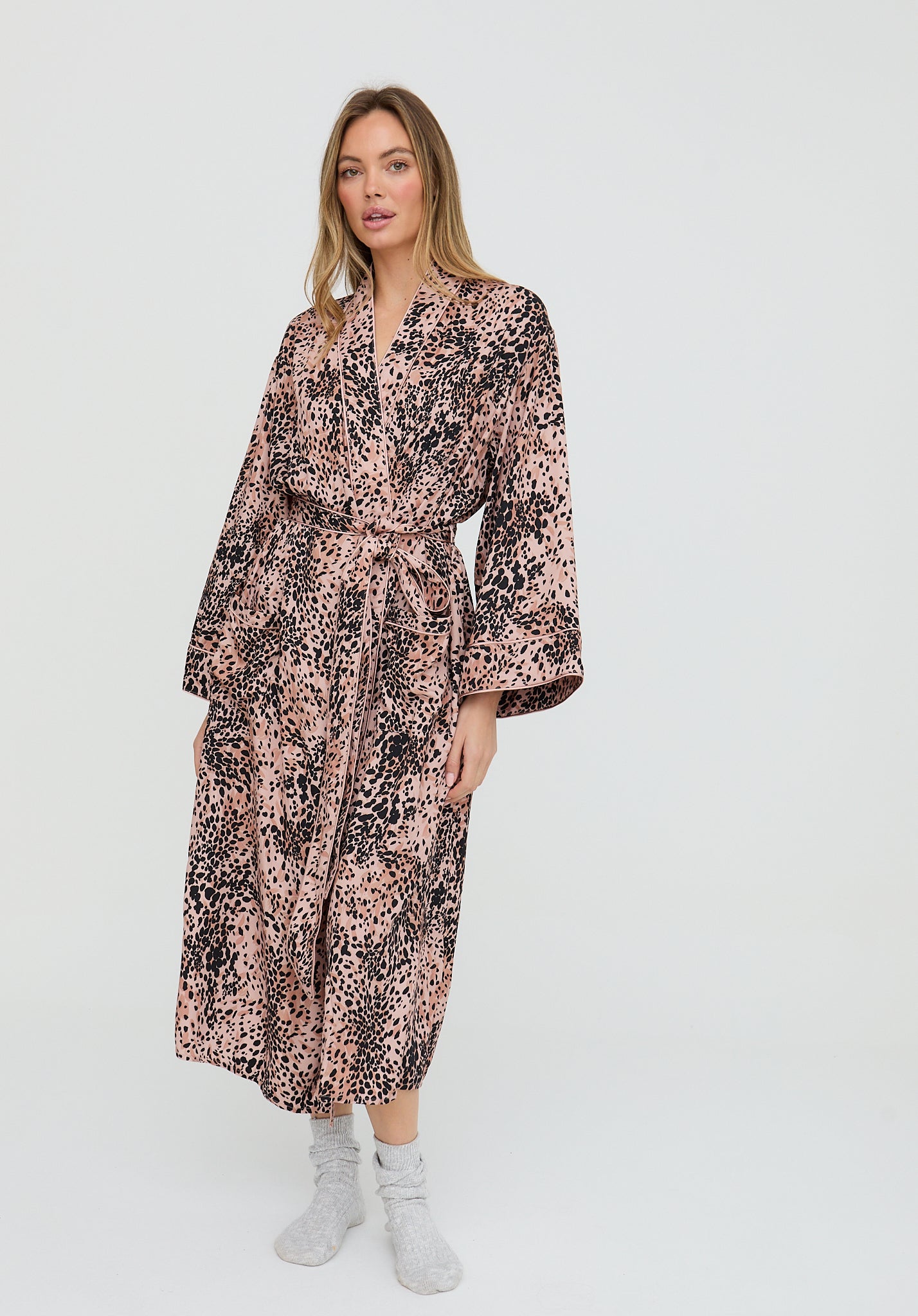 Woman wearing a floral dress on a white background