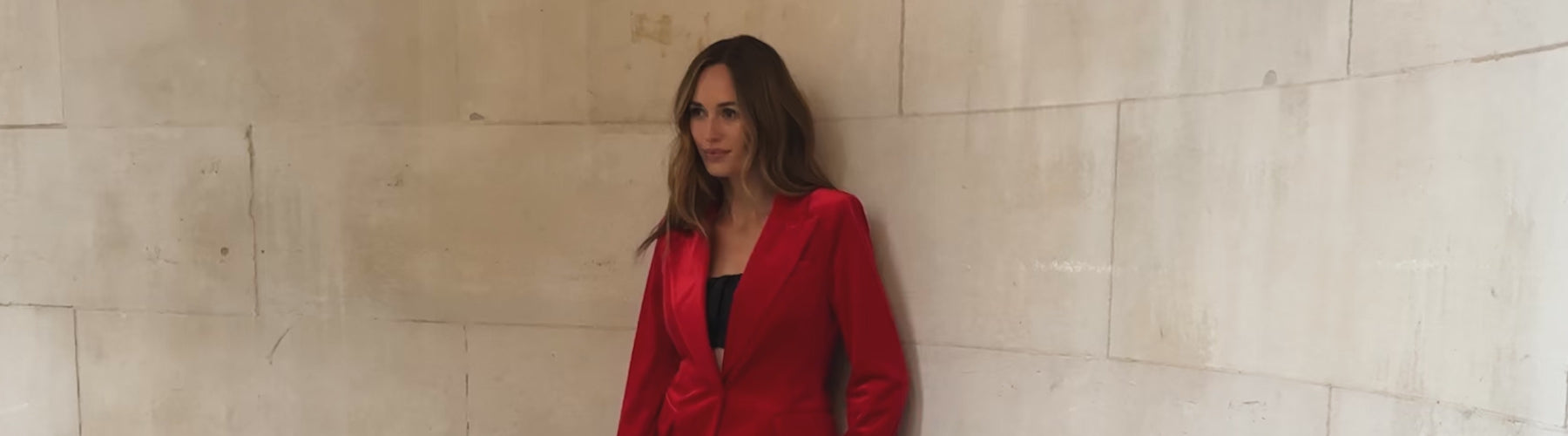 Video showing model wearing the Sienna Tailored Velvet Blazer In red with Sienna Straight Leg Velvet Trouser In red. 